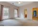Bedroom with carpet, neutral walls, and access to a private bathroom at 960 Todd Dr, Covington, GA 30014