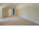 Spacious bonus room with carpet and extra storage at 960 Todd Dr, Covington, GA 30014