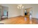 Spacious dining room with hardwood floors and chandelier at 960 Todd Dr, Covington, GA 30014