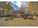 Brick home with two-story facade and manicured lawn at 960 Todd Dr, Covington, GA 30014