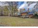 Brick home with a large backyard and deck at 960 Todd Dr, Covington, GA 30014