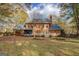 Brick house with a large backyard and deck at 960 Todd Dr, Covington, GA 30014