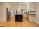 Bright kitchen with stainless steel appliances and hardwood floors at 960 Todd Dr, Covington, GA 30014