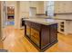 Open kitchen with large island and hardwood floors at 960 Todd Dr, Covington, GA 30014