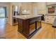 Kitchen island with marble top and dark wood base at 960 Todd Dr, Covington, GA 30014