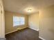 Well-lit bedroom with neutral carpeting and large window at 2780 Mitchell Dr, Decatur, GA 30032
