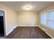 Simple dining room with hardwood floors and neutral walls at 2780 Mitchell Dr, Decatur, GA 30032