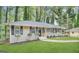Updated ranch home with landscaped yard and walkway at 2780 Mitchell Dr, Decatur, GA 30032