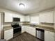 Modern kitchen with granite counters and stainless steel appliances at 2780 Mitchell Dr, Decatur, GA 30032