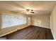 Spacious living area with hardwood floors and large window at 2780 Mitchell Dr, Decatur, GA 30032