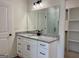Modern bathroom featuring white cabinetry, granite countertop, matte black hardware, and a walk-in shower at 4619 Parkwood Rd, Social Circle, GA 30025
