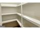 Organized pantry with built-in shelving for convenient storage and accessibility, maximizing space at 4619 Parkwood Rd, Social Circle, GA 30025