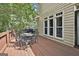 Deck with outdoor seating, and barbeque area, perfect for outdoor dining and entertaining at 230 Hedgewick Way, Tyrone, GA 30290