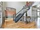 Spacious foyer with hardwood floors and staircase at 230 Hedgewick Way, Tyrone, GA 30290