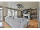 Bright living room featuring a fireplace, built-in bookshelves, hardwood flooring and lots of natural light at 230 Hedgewick Way, Tyrone, GA 30290