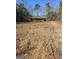 Small rustic cabin on a cleared lot at 8025 Creekwood Dr, Fairburn, GA 30213