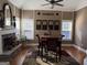 Spacious dining room with hardwood floors, fireplace, and decorative wall art at 100 Harmony Ct, Dallas, GA 30157