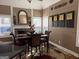 Dining room with hardwood floors, fireplace, and decorative wall art at 100 Harmony Ct, Dallas, GA 30157