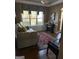 Living room featuring hardwood floors, sofa, and wine rack at 100 Harmony Ct, Dallas, GA 30157