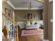 Bright living room with a comfy couch and decorative rug at 100 Harmony Ct, Dallas, GA 30157