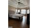Large main bedroom with king-size bed and ample natural light at 100 Harmony Ct, Dallas, GA 30157