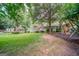 Expansive backyard featuring a well-maintained lawn, gazebo, deck, and play set at 3170 Ebenezer Rd, Marietta, GA 30066