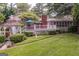 Spacious backyard featuring a deck, gazebo, and well-maintained landscaping at 3170 Ebenezer Rd, Marietta, GA 30066