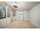 This bedroom offers a soft neutral carpet, a window with woven shades, and a ceiling fan at 3170 Ebenezer Rd, Marietta, GA 30066