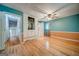 Bedroom with hardwood floors, ceiling fan, built-in cabinets, and en suite bathroom at 3170 Ebenezer Rd, Marietta, GA 30066