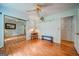 Bedroom with a bench, shelves, hardwood floors, closet, and en suite at 3170 Ebenezer Rd, Marietta, GA 30066