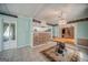 Dining area featuring a partial view of kitchen, mosaic tile detail, and vintage sewing machine table at 3170 Ebenezer Rd, Marietta, GA 30066