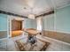 Charming dining room with decorative wallpaper, a chandelier, and tile floors at 3170 Ebenezer Rd, Marietta, GA 30066
