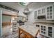 Bright kitchen featuring white cabinets, granite countertops, and stainless steel appliances at 3170 Ebenezer Rd, Marietta, GA 30066