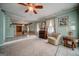 Bright living room with tile floors, fireplace, and view into dining area with vintage table at 3170 Ebenezer Rd, Marietta, GA 30066