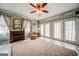 Cozy living room featuring a fireplace, tile flooring, and natural light from French doors at 3170 Ebenezer Rd, Marietta, GA 30066