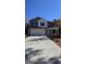 Two-story house with gray siding, white accents, and a two-car garage at 55 Heyman Drive # 83, Covington, GA 30016