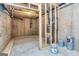 Unfinished basement area with exposed framing at 65 Oakhurst Trl, Sharpsburg, GA 30277