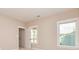 Bright bedroom with two windows and access to backyard at 65 Oakhurst Trl, Sharpsburg, GA 30277