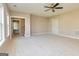 Spacious bonus room with high ceilings and ceiling fan at 65 Oakhurst Trl, Sharpsburg, GA 30277