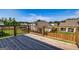 Wooden deck overlooking backyard and neighboring houses at 65 Oakhurst Trl, Sharpsburg, GA 30277