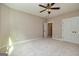 Spacious bedroom with ceiling fan and ample closet space at 20 Platinum Rdg, Sharpsburg, GA 30277