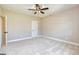 Simple bedroom with carpeted floor and ceiling fan at 20 Platinum Rdg, Sharpsburg, GA 30277