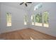 Bedroom with hardwood floors and large windows at 20 Platinum Rdg, Sharpsburg, GA 30277