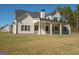Two-story house with large backyard and covered patio at 20 Platinum Rdg, Sharpsburg, GA 30277