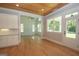 Open kitchen with white cabinets and island at 20 Platinum Rdg, Sharpsburg, GA 30277