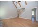 Living room with hardwood floors and vaulted ceiling at 20 Platinum Rdg, Sharpsburg, GA 30277