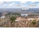 Aerial view of the neighborhood in Covington GA, with the home featured in an inset at 25 Abelia Dr, Covington, GA 30014