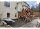 View of a backyard featuring a patio and raised wooden deck, great for Gathering entertainment at 25 Abelia Dr, Covington, GA 30014