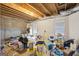 Spacious unfinished basement with exposed ceiling, ready for customization at 25 Abelia Dr, Covington, GA 30014