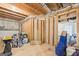 Unfinished basement with exposed ceiling beams ready for customization at 25 Abelia Dr, Covington, GA 30014